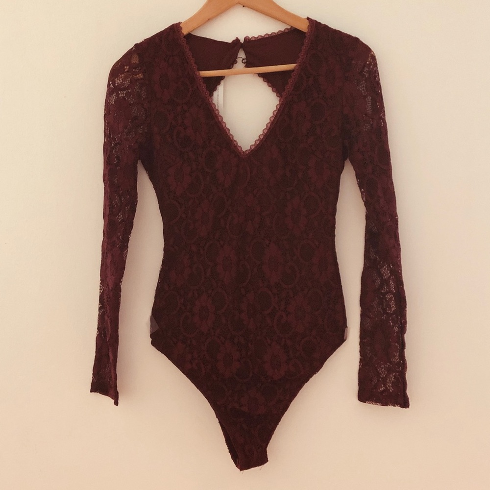 NWT long sleeved lace bodysuit
